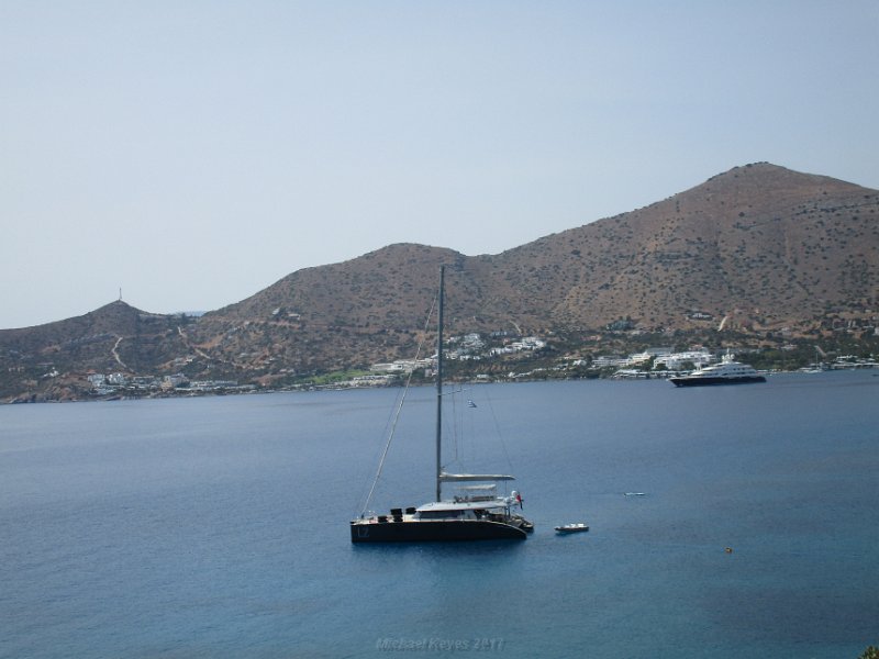 IMG_1532.JPG - After Passing the Bride and Groom we found some yachts Moored in a quiet cove.  Later we learned the Prince of Jordan was on One of them. I  believe the one in the distance. 